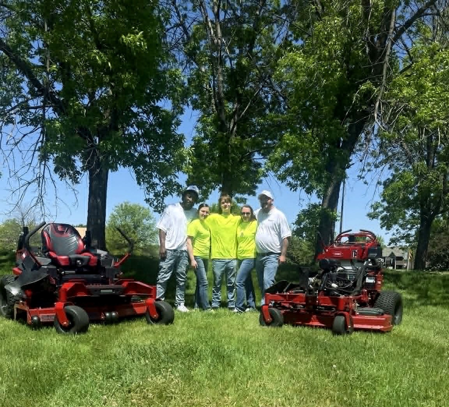 Minneapolis North Outdoor Services crew standing together outdoors